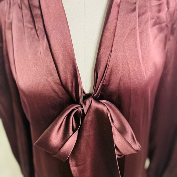 New authentic Burberry silk stretchy blouse in burgundy  with a bow on a front. - Picture 2 of 8